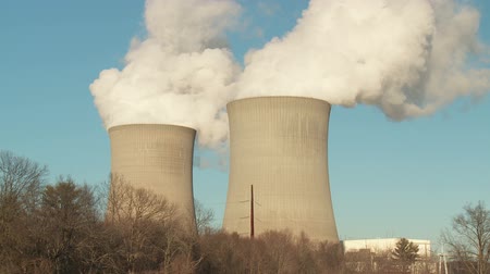 Hyperboloid cooling towers emit steam at the Susquehanna Steam Electric Station, a nuclear power station owned and operated by Pennsylvania Power & Light in the Susquehanna Valley in Luzerne County near Berwick, Pennsylvania.